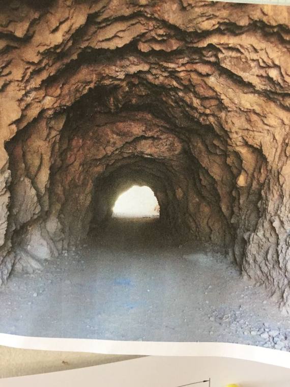 Carved and painted rock tunnel, built from foam and plaster