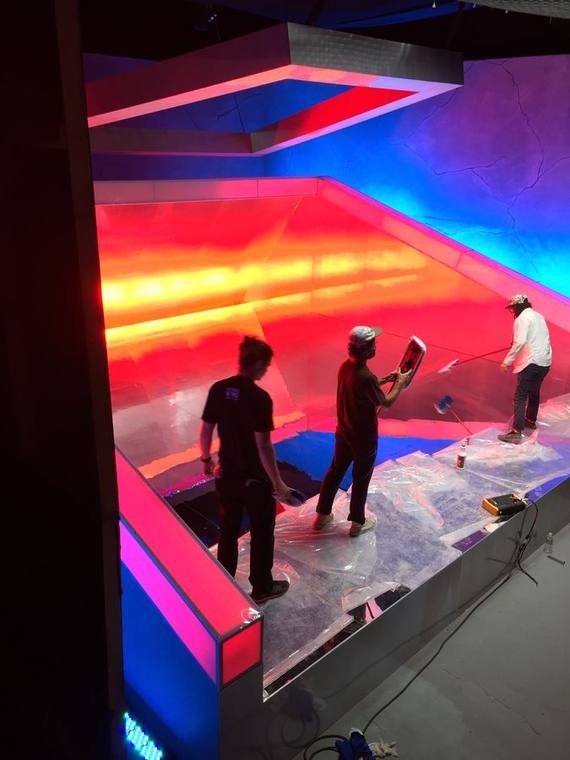Colour-block stage set in blue and red