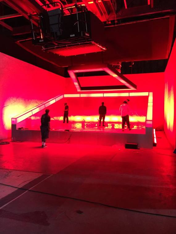 Neon stage set with a floating light frame